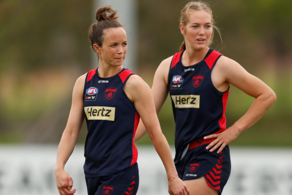 Melbourne skipper Daisy Pearce, left, watches on as the Dees take part in a pre-season practice match.