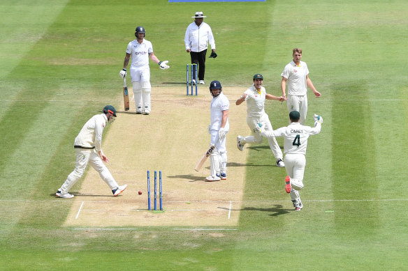 Jonny Bairstow of England is stumped by Alex Carey. 