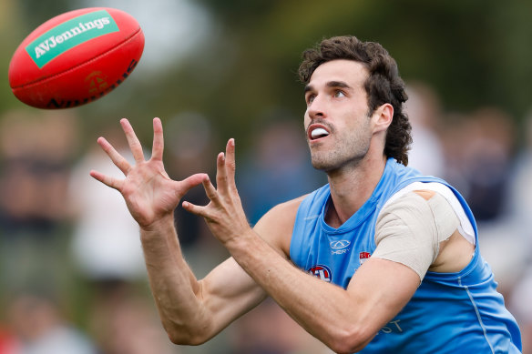 St Kilda’s Max King looks to mark the ball.