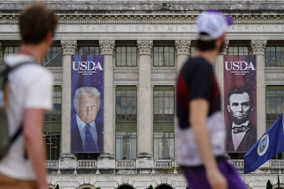 Banners showing the faces of Trump and Abraham Lincoln have been installed at the US Department of Agriculture in Washington.
