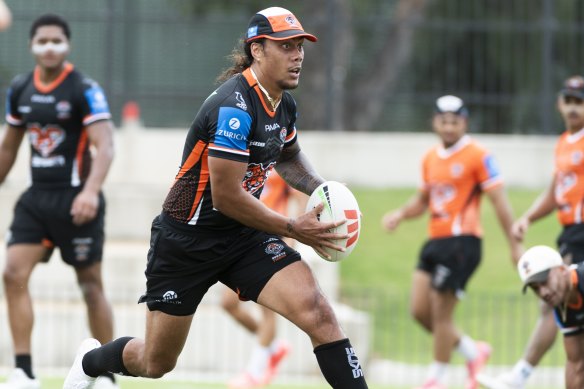 Jarome Luai running the show at Tigers training.