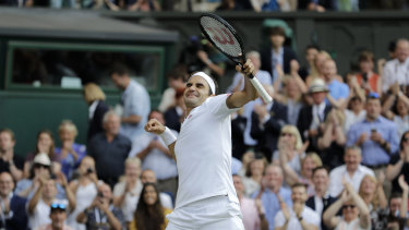 Roger Federer celebrates defeating Rafael Nadal during their semi-final.