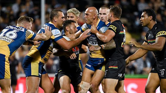 Blake Ferguson squabbles with Penrith players after he was accused of milking a penalty.
