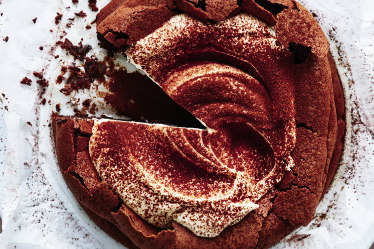 Helen Goh’s flourless chocolate crater cake with spiced whipped cream.
