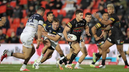 Nathan Cleary bulldozes through North Queensland's defence.