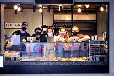 Helping hands: Paul Hamilton , Michelle Sam, Hendrik Roessmann Anita Seferian and Thomas Bullough pitch in while most of the bakery’s staff are at home in isolation. 