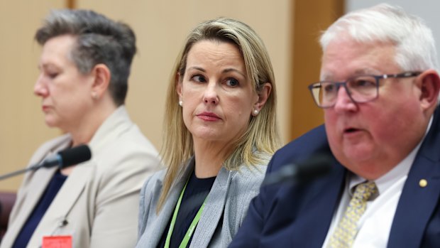 Interim Vice-Chancellor Rebekah Brown, centre, told Senate estimates that she maintained confidence in the CASS dean.