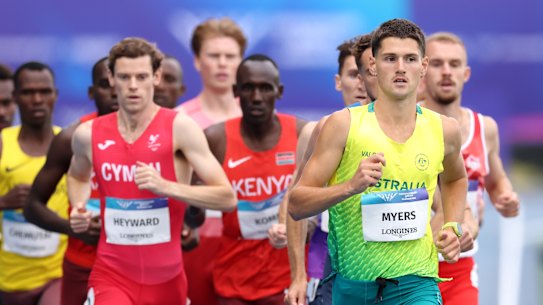 Australian Cameron Myers leads the way in the men's mile heat in Glasgow, which he won.