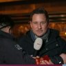 A Dutch reporter is manhandled by a Chinese official while on air.