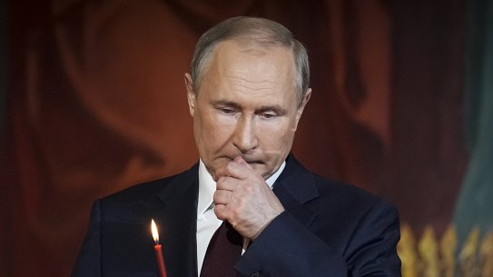 Russian President Vladimir Putin attends an Orthodox Easter service two months after invading Ukraine.