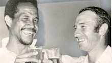 Garry Sobers and Doug Walters after a Test match at the MCG in 1972.