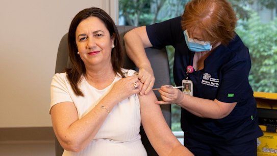Queensland Premier Annastacia Palaszczuk is given the her COVID-19 vaccination by clinical nurse Dawn Pedder at the Surgical Treatment Rehabilitation Service Centre in Brisbane.