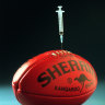  Picture shows Sherrin Football with syringe-for drugs in AFL football story. [used a part of composite graphic] drugs, injection, jab, painkiller, syringe, ball