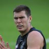 Cox re-signs with Pies, as Suns delist ex-premiership Tiger