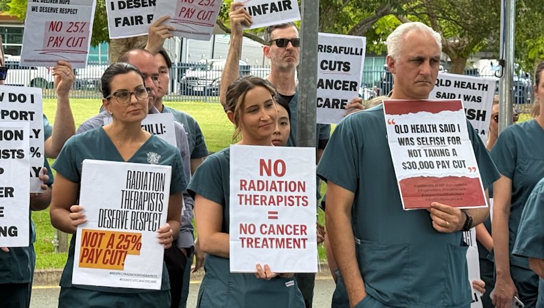 Hundreds of cancer specialists walk off the job over $30k pay cut