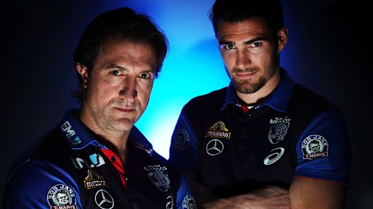 Bulldogs coach Luke Beveridge (left) and captain Easton Wood.
