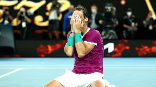 MELBOURNE, AUSTRALIA - JANUARY 30: Rafael Nadal of Spain celebrates match point in his Men’s Singles Final match against Daniil Medvedev of Russia during day 14 of the 2022 Australian Open at Melbourne Park on January 30, 2022 in Melbourne, Australia. (Photo by Mark Metcalfe/Getty Images)