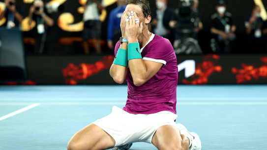 MELBOURNE, AUSTRALIA - JANUARY 30: Rafael Nadal of Spain celebrates match point in his Men’s Singles Final match against Daniil Medvedev of Russia during day 14 of the 2022 Australian Open at Melbourne Park on January 30, 2022 in Melbourne, Australia. (Photo by Mark Metcalfe/Getty Images)