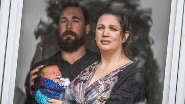 David and Angela Lawton with their new baby, Evander.