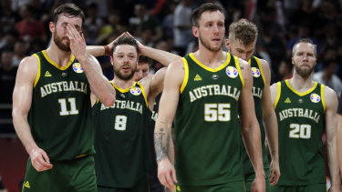 Hoop dreams shattered:  Australian players (from left) Nick Kay, Matthew Dellavedova, Mitch Creek, and David Barlow react after the loss to France in third-place play-off at the FIBA Basketball World Cup in Beijing.