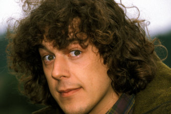 Alan Davies, pictured in 1996, was not allowed to mourn his mother who died when he was only six.