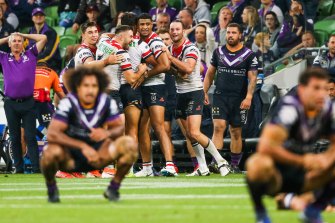 Melbourne Storm players react to a golden-point loss to the Roosters this year.