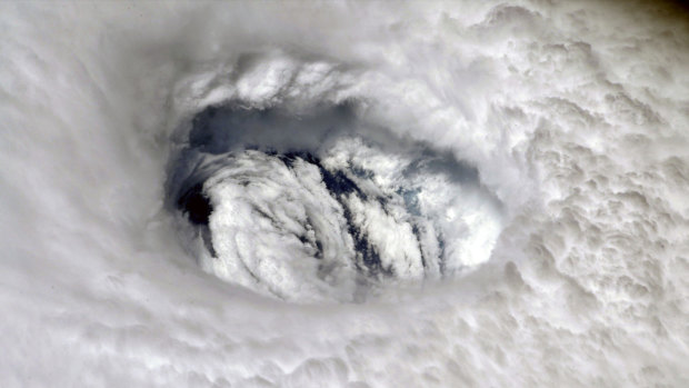The eye of Hurricane Dorian over the Bahamas on Monday. Dorian has rebuilt into a Category 3 storm.