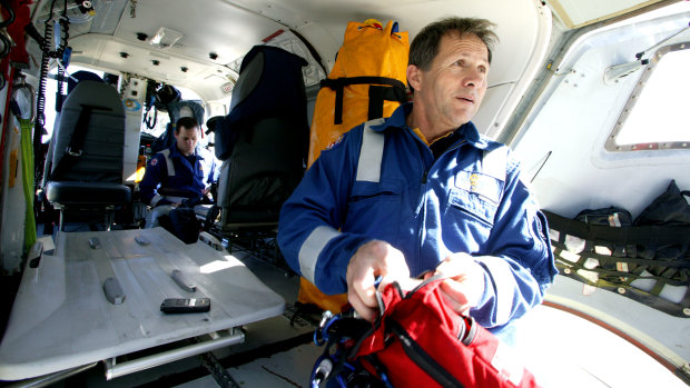Specialist paramedic Harry Gatt (right), pictured in a helicopter in 2004.