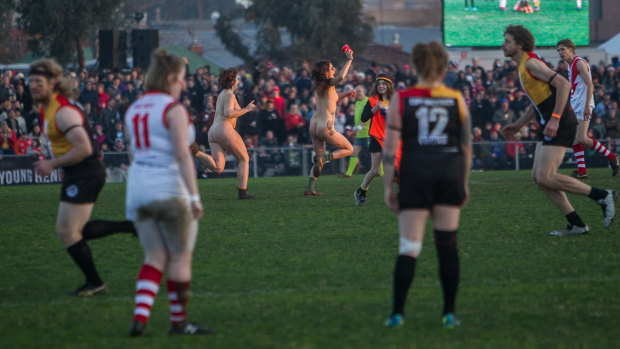 Streakers took to the field after word spread that they would not be arrested unless someone complained. 