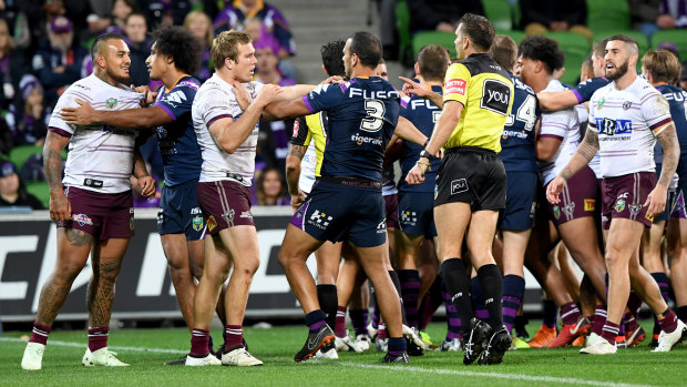 Players from Manly and Melbourne get into a fight.
