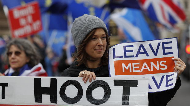 Demonstrators protest for Britain's Brexit split from Europe, outside the Houses of Parliament in London on Thursday.