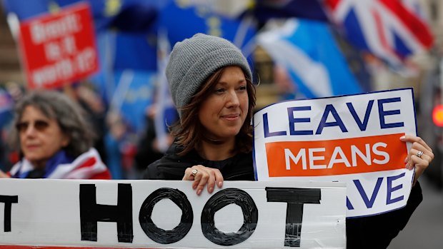 Demonstrators protest for Britain's Brexit split from Europe, outside the Houses of Parliament in London on Thursday.