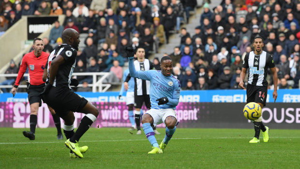 Raheem Sterling scores the opening goal during City's clash with Newcastle United in Newcastle upon Tyne.