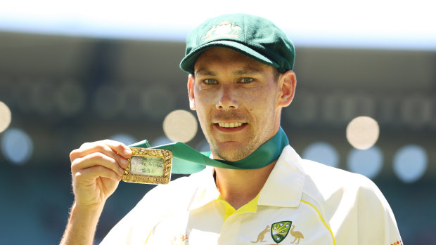 Scott Boland poses with the Johnny Muller medal after Australia crushing win over England. 