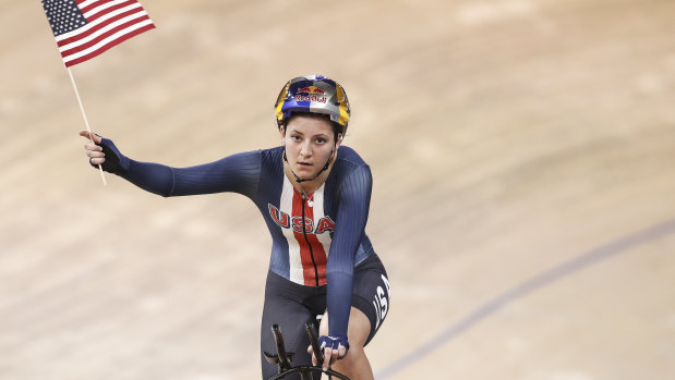 Chloe Dygert celebrates winning the women's individual pursuit and setting the world record.