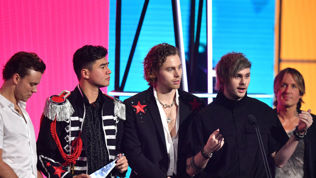 5 Seconds of Summer accepting the ARIA for Best Australian Live Act in November.