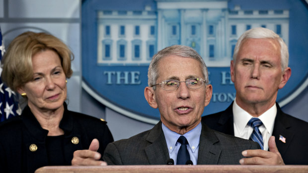 Anthony Fauci, director of the National Institute of Allergy and Infectious Diseases, centre, addresses the media alongside Vice-President Mike Pence, right, and Deborah Birx, coronavirus response coordinator, on Monday.