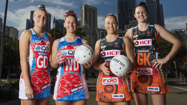 Derby: Maddy Turner, Abbey McCulloch, Kim Green and Sam Poolman model the Indigenous dresses the Swifts and Giants will wear this weekend.