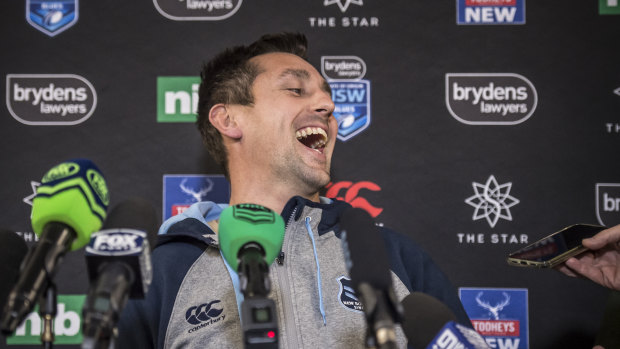 A relaxed Mitchell Pearce cracks a gag at Blues Origin camp.