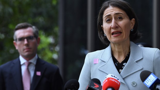 Battle lines: NSW Premier Gladys Berejiklian  and Treasurer Dominic Perrottet, who revealed in April that he had been working on a cabinet proposal to halt public servants' pay rises for 12 months.
