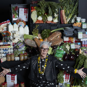 OzHarvest CEO Ronni Kahn with 312 kilograms of food, the amount wasted in Australia per person every year.