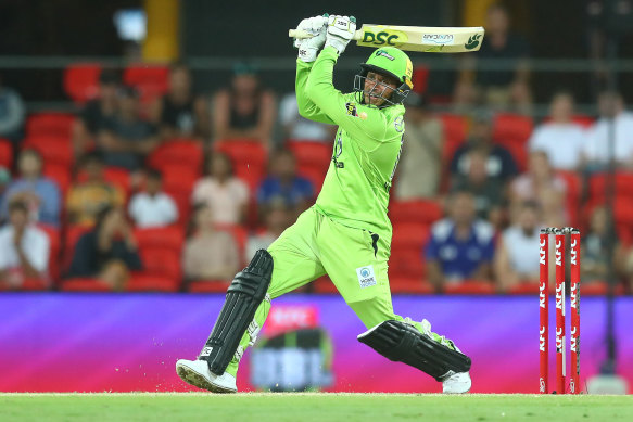 Usman Khawaja flashing his bat for the Sydney Thunder.