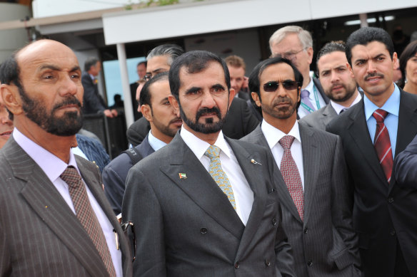 Sheikh Mohammed (centre) at the Melbourne Cup in 2010.