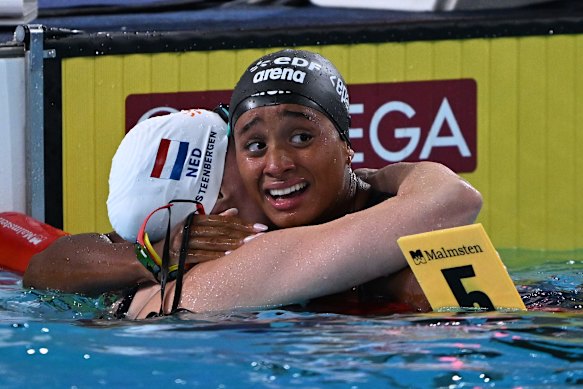 Italy’s Sara Curtis reacts after breaking Kaylee McKeown’s 50m backstroke world record. 