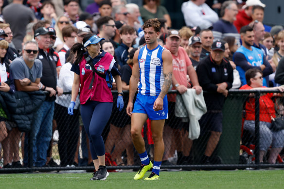 Jy Simpkin is taken off the ground on Sunday following the heavy hit he copped from St Kilda’s Jimmy Webster.