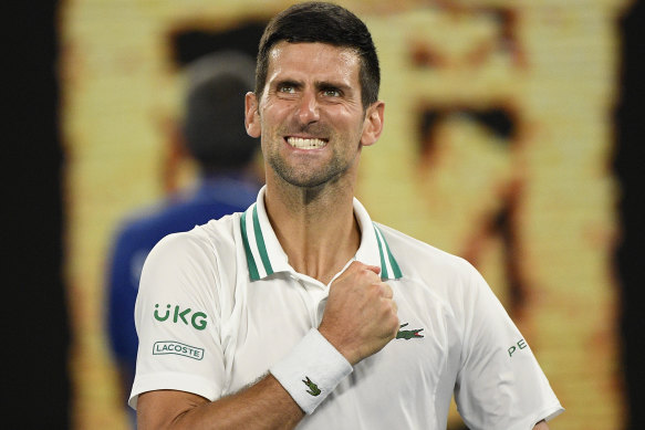 Novak Djokovic celebrates after defeating Russia’s Aslan Karatsev in their semi-final.