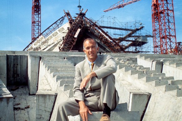 Jørn Utzon in front of the partially constructed Opera House in 1965.