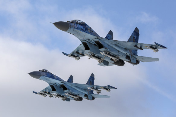 Su-27 fighter jets fly above a military base in the Zhytomyr region, Ukraine in 2018.