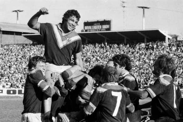Easts players carry Arthur Beetson after their victory in the 1974 grand final at the SCG.