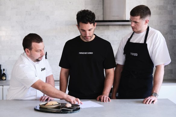 Chefs Adem Kurcan (left) and Kevin Condon (right) with Vow founder George Peppou. 